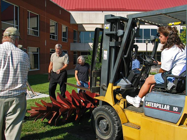 Sept. 20, 2006 - Longwood University, Farmville, Virginia.<br />Installation and priming of Joyce's "Strobus".<br />The pine cone part about to be lifted with Joyce supervising.