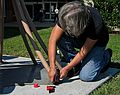 Sept. 20, 2006 - Longwood University, Farmville, Virginia.<br />Installation and priming of Joyce's "Strobus".<br />Joyce attaching a setscrew to fasten one of the needles.