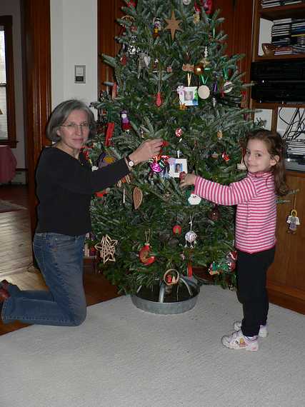 Dec. 3, 2006 - Merrimac, Massachusetts.<br />Joyce and Miranda hugging the Christmas tree.
