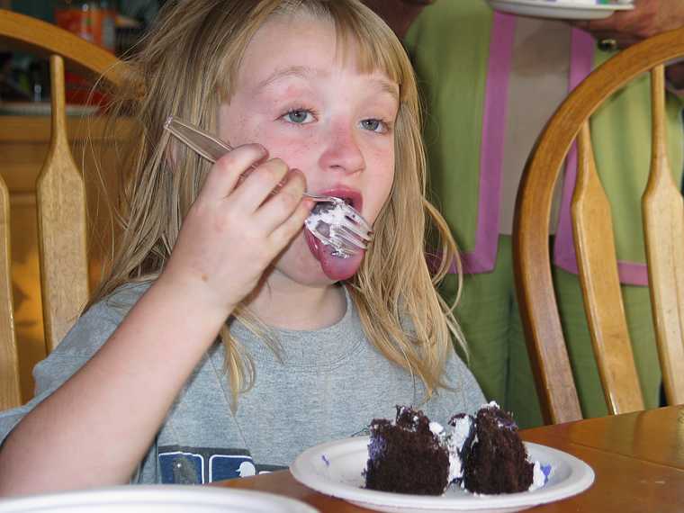 May 13, 2007 - Mother's Day at Tom and Kim's in South Hampton, New Hampshire.<br />Elise enjoying the frosting on the cake.