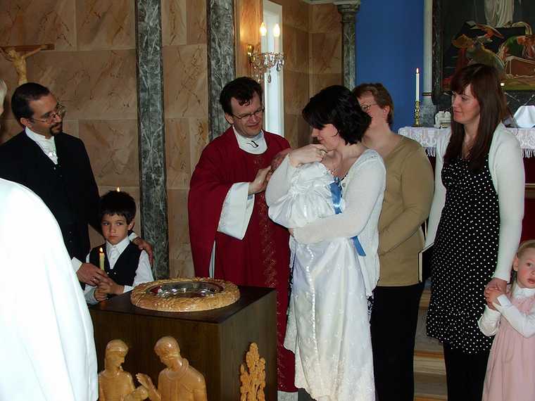 May 27, 2007 - Vogar, Iceland.<br />Marks' christening.<br />Eric, Gujn, pastor, Marks, Inga, and more.