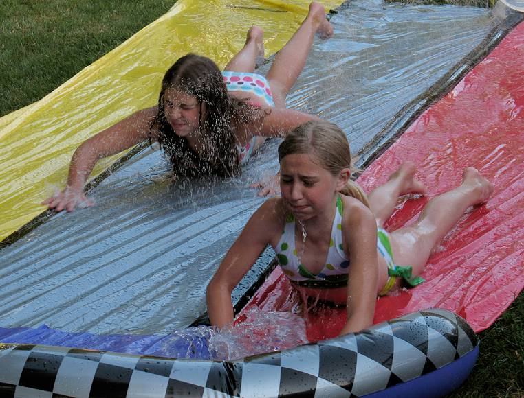 June 24, 2007 - South Hampton, New Hampshire.<br />Graduation party for Michael and Colin.<br />Marissa and friend on the water slide.