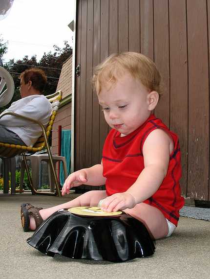 July 1, 2007 - Lawrence, Massachusetts.<br />Matthew's 1st birthday celebration.<br />Matthew with a bowl made out of an LP (long playing (about 30 min.) record).