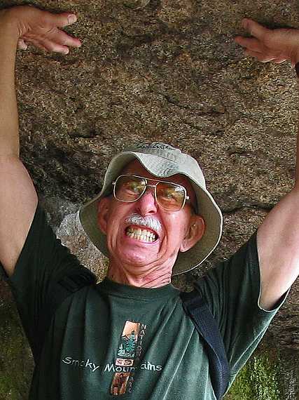 July 10, 2007 - Pawtuckaway State Park, Nottingham, New Hampshire.<br />A crop of the previous photo:<br />is Ronnie trying to lift the boulder rather than just hold it?