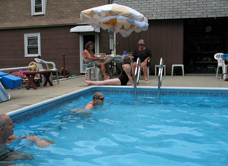 July 11, 2007 - Lawrence, Massachusetts.<br />Baiba and Ronnie visiting Marie's resort.<br />Ronnie and Baiba enjoying the pool while Paul, Joyce, and Norma discuss world news.