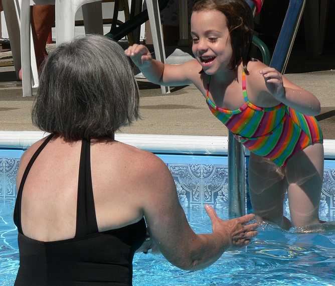 July 22, 2007 - Lawrence, Massachusetts.<br />At Marie's pool to celebrate Holly's birthday.<br />Joyce about to catch Miranda.