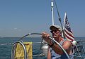 July 26, 2007 - On the Atlantic off the coast of Massachusetts/New Hampshire.<br />A few hours of sailing with Nancy and John.<br />John at the helm.