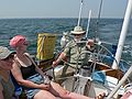 August 3, 2007 - On the Atlantic off the coast of Massachusetts.<br />Sailing on John and Nancy's boat.<br />Joyce, Deb, and Egils wrestling with the helm.