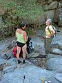 August 12, 2007 - On the Marble Fork of Kaweah River, Sequoia National Park, California.<br />Melody getting ready for the trip down the canyon while talking to Joyce.<br />Her leg still bears the scars from a bad case of poison oak.