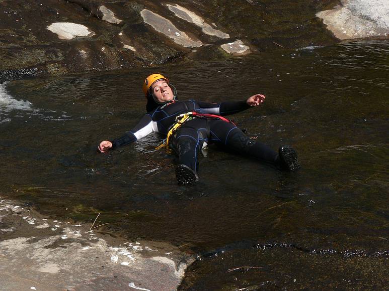 August 15, 2007 - Sequoia National Forest, California.<br />At the canyoneering trip start on Ten Mile Creek.<br />Melody cooling off while waiting for the last to get ready.