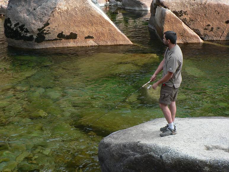 August 16, 2007 - Kings Canyon National Park, California.<br />Sati trying his luck with fishing.