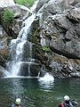 August 17, 2007 - At Marble Falls, Sequoia National Park, California.<br />Melody hitting the water. Brad, on the left foreground, recording the sound with microphones<br />attached to his helmet.