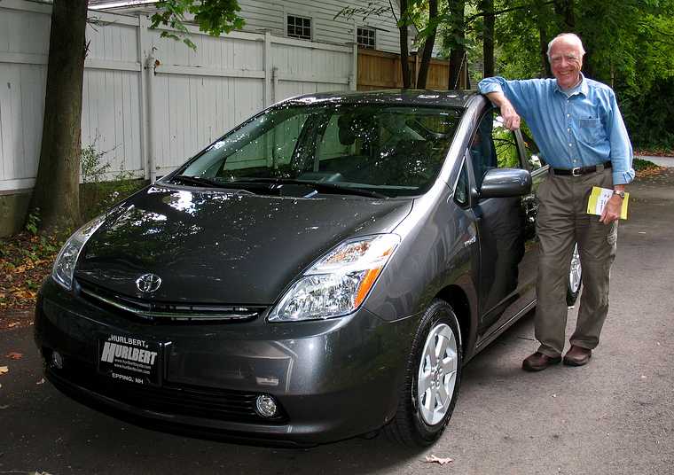 October 2, 2007 - Merrimac, Massachusetts.<br />John and his new Toyota Prius Hybrid car.