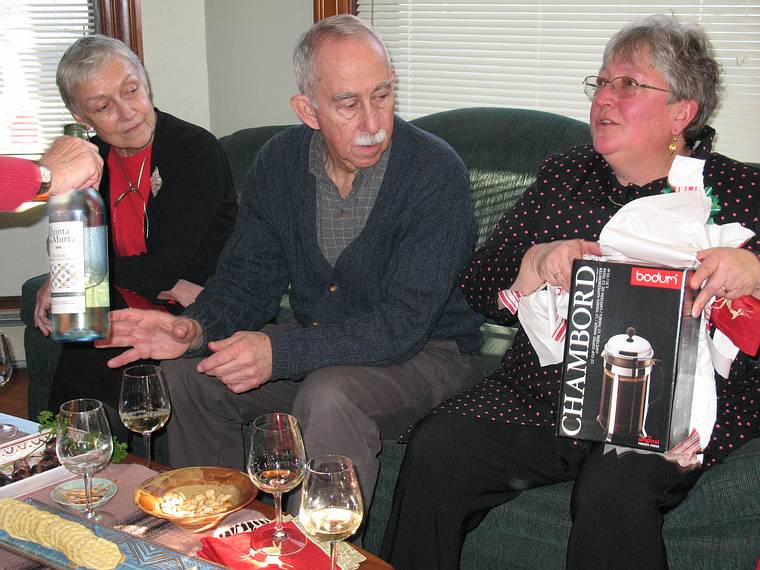 Dec. 25, 2007 - Merrimac, Massachusetts.<br />Baiba and Ronnie admiring Norma's French press coffee maker<br />while Norma tells Paul (handing a bottle to Ronnie) "Honey, we have one more way to enjoy coffee!".