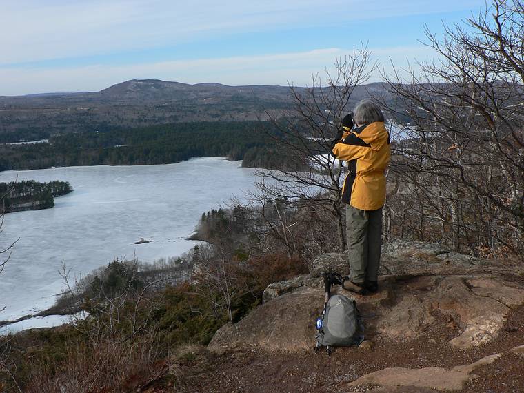 Jan. 13, 2008 - Camden, Maine.<br />Joyce atop Maiden Cliff overlooking Meganticook Lake.