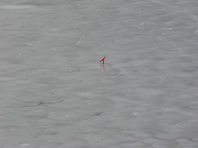 Jan. 13, 2008 - Camden, Maine.<br />Ice scater with sail on Meganticook Lake from atop Maiden Cliff.