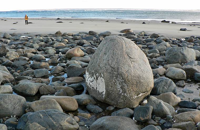 Jan. 20, 2008 - Sandy Point State Reservation, Plum Island, Massachusetts.<br />The rock with Joyce in the distance.