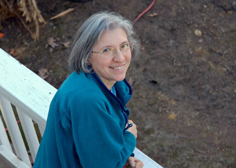April 17, 2008 - Merrimac, Massachusetts.<br />Joyce watching me photograph the construction of her studio from our bedroom window.