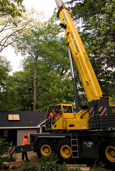 May 23, 2008 - Merrimac, Massachusetts.<br />The tree behind the garage being removed. Its base was starting to rot.