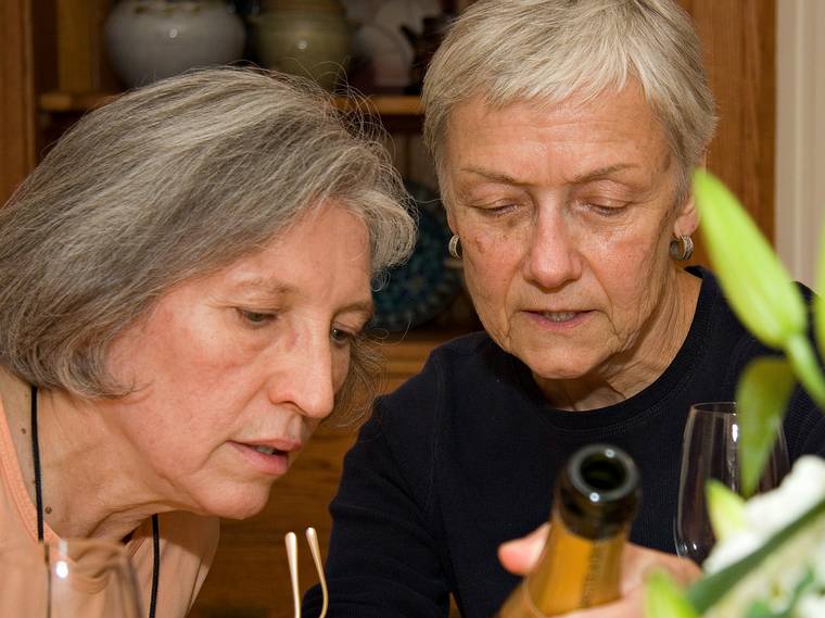 June 20, 2008 - Baltimore, Maryland.<br />Joyce and Baiba studying the label of the dessert wine.