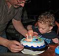 June 29, 2008 - Mendon, Massachusetts.<br />Matthew's 2nd birthday celebration.<br />Carl presenting Matthew with his birthday cake.