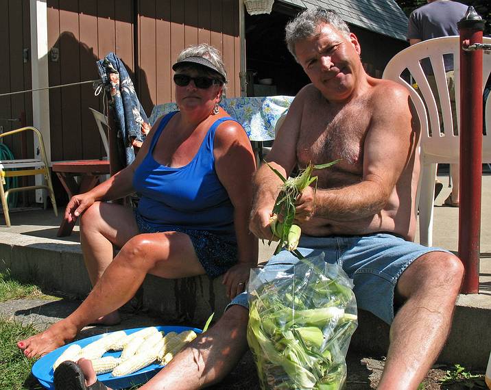 July 13, 2008 - Lawrence, Massachusetts.<br />Norma and Jim shucking the corn.
