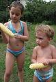 July 17, 2008 - Lawrence, Massachusetts.<br />Miranda and Matthew removing the hair from the corn.