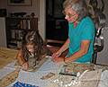 August 3, 2008 - Merrimac, Massachusetts.<br />Miranda and Joyce cutting out a pattern for a dress for Miranda.