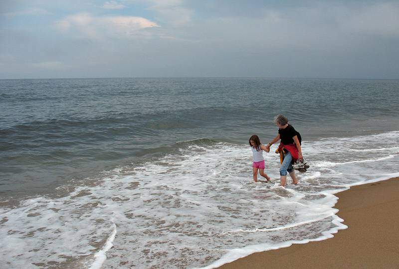 August 3, 2008 - North end of Plum Island, Massachusetts.<br />Joyce keeping a firm grip on Miranda, who always wanted to go deeper.<br />By the end of the walk Miranda was wet to her neck from the waves.