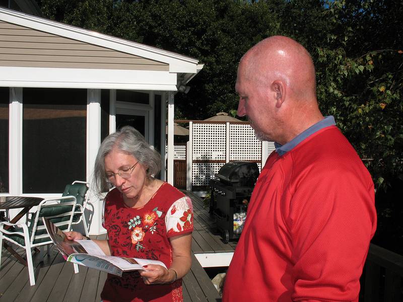 Sept. 20, 2008 - At Tom and Kim's in South Hampton, New Hampshire.<br />Celebrating Eric's birthday and to wish him and Gujn a good trip back home to Iceland.<br />Joyce reading the cooking directions for the chicken to Tom.