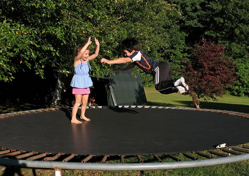 Sept. 20, 2008 - At Tom and Kim's in South Hampton, New Hampshire.<br />Celebrating Eric's birthday and to wish him and Gujn a good trip back home to Iceland.<br />Miranda and Gujn on the trampoline.