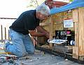 Oct. 11, 2008 - Campton, New Hamshire.<br />At Bill and Carol's log cabin.<br />Bill fixing the hot tub.