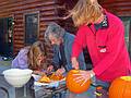 Oct. 11, 2008 - Campton, New Hamshire.<br />At Bill and Carol's log cabin.<br />Aili, Joyce, and Carol carving pumpkins.