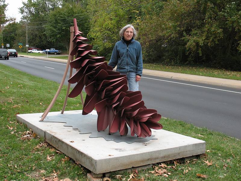 October 24, 2008 - Charlottesville, Virginia.<br />Installing 'Strobus' on the median of 5th Street SW along Tonsler Park.<br />Joyce with her sculpture. Art in Place is the organization sponsoring the installation.