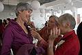 October 18, 2008 - Julian and Gisela's wedding, Brooklyn, New York.<br />Joyce and Baiba attaching Heidi's corsage.
