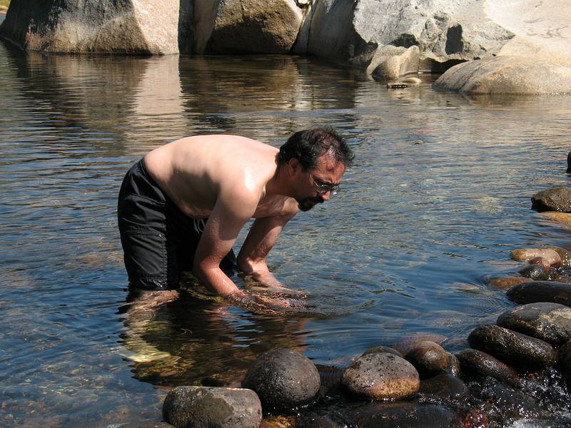 Sept. 5, 2008 - Day before Melody's and Sati's wedding at Mono Hot Springs, California.<br />Eric raising the dam.