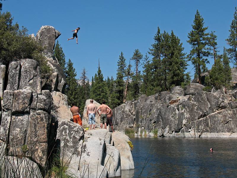 Sept. 6, 2008 - Melody's and Sati's wedding day at Mono Hot Springs, California.<br />Eric jumping while Sati and others watch.