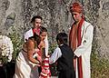 Sept. 6, 2008 - Melody's and Sati's Wedding at Mono Hot Springs, California.<br />Gujn handing the garlands to Melody while Brad M. and Sati watch.