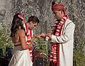 Sept. 6, 2008 - Melody's and Sati's Wedding at Mono Hot Springs, California.<br />Sati placing the ring on Melody's finger.