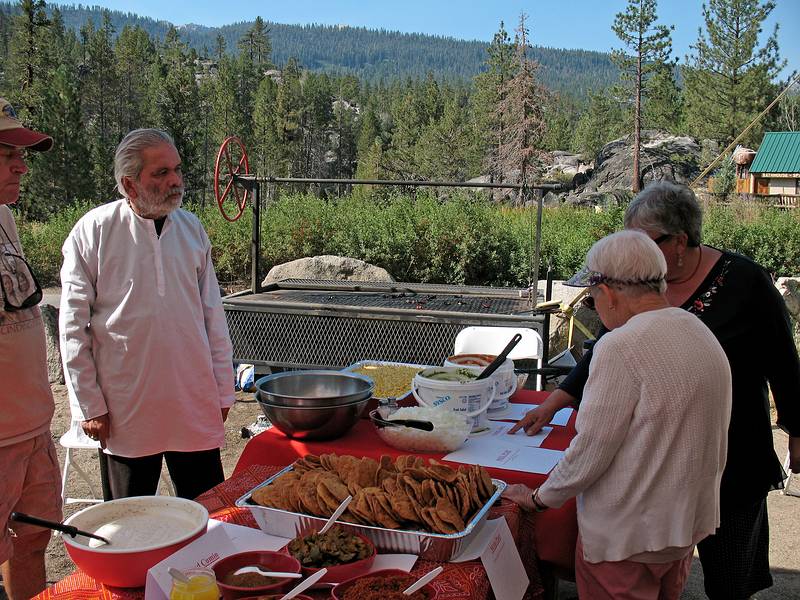 Sept. 7, 2008 - The day after Melody's and Sati's wedding at Mono Hot Springs, California.<br />Indian brunch courtesy of Suman and Sargam.<br />Paul and Suman watch Norma explain the food choices to Marie.