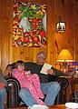 Feb. 19, 2009 - At Bill and Carol's in Campton, New Hampshire.<br />Sasha with Bill reading a Robert Service poem.
