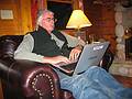 Feb. 19, 2009 - At Bill and Carol's in Campton, New Hampshire.<br />John reading a Robert Service poem off the internet.