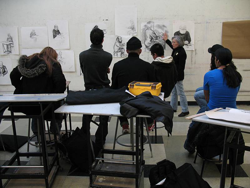 Feb. 25, 2009 - Middlesex Community College, Lowell, Massachusetts.<br />Joyce commenting on her students' drawings of me.