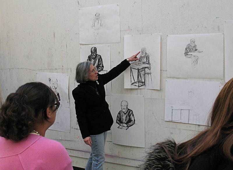 Feb. 25, 2009 - Middlesex Community College, Lowell, Massachusetts.<br />Joyce commenting on her students' drawings of me.