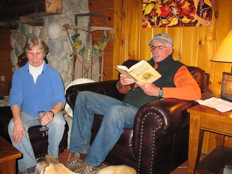 April 4, 2009 - At Bill and Carol's log cabin in Campton, New Hampshire.<br />Nancy listening and John reading a Longfellow poem.