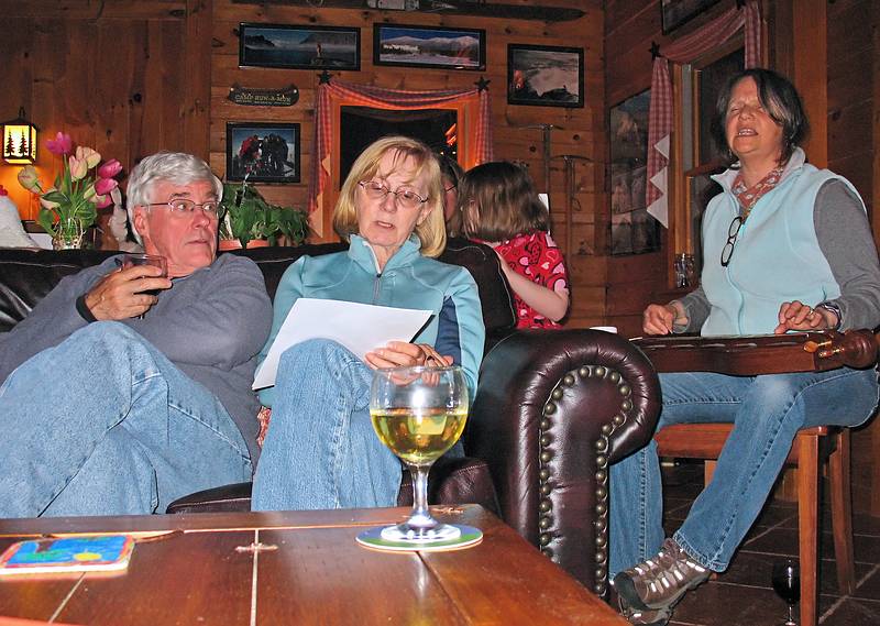 April 4, 2009 - At Bill and Carol's log cabin in Campton, New Hampshire.<br />Mark, Joyce H., singing while Moe is playing the lap dulcimer.