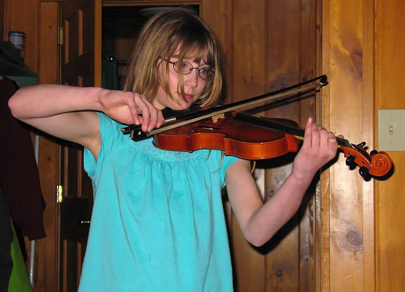 April 4, 2009 - At Bill and Carol's log cabin in Campton, New Hampshire.<br />Aili on the violin.