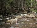 April 5, 2009 - Hiking along Smarts Brook in the Waterville Valley, New Hampshire.<br />Smarts Brook from Yellow Jacket Trail bridge.<br />View downstream. Note cairn on rock.