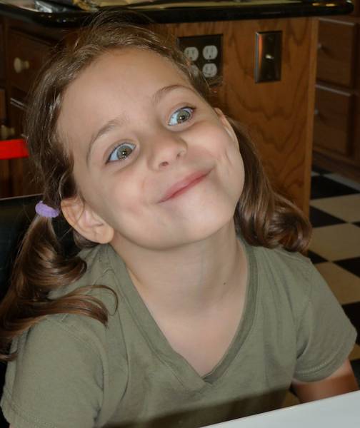 May 10, 2009 - Mothers Day at Paul and Norma's in Tewksbury, Massachusetts.<br />Miranda chewing a pickle.