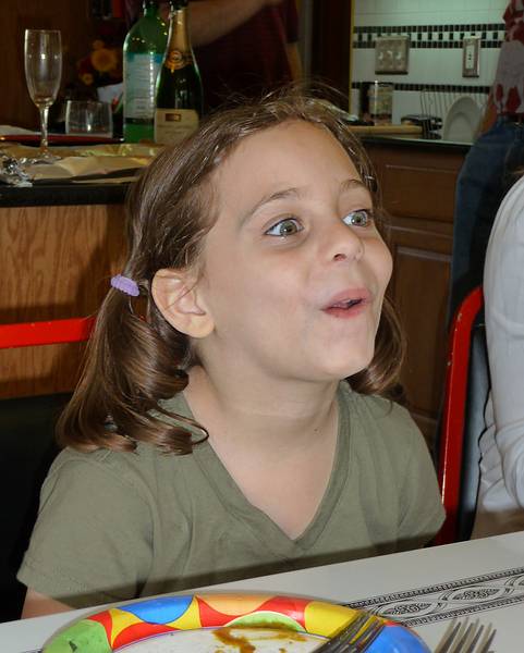 May 10, 2009 - Mothers Day at Paul and Norma's in Tewksbury, Massachusetts.<br />Miranda chewing a pickle.